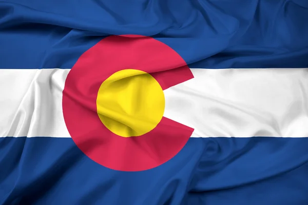 挥舞着科罗拉多州旗 — 图库照片