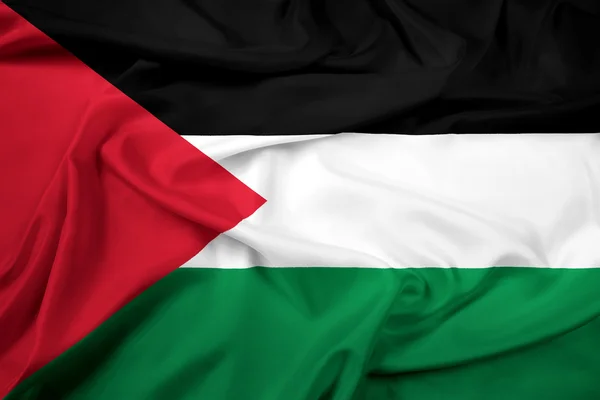 Macha flagą Palestyny — Zdjęcie stockowe