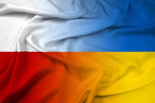 Wapperende vlag van Polen en Oekraïne — Stockfoto