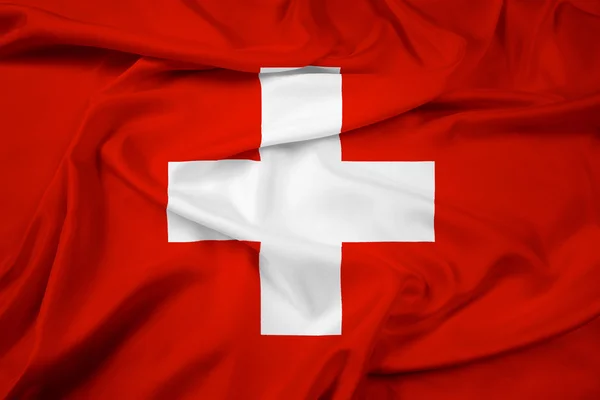 Флаг Швейцарии размахивая — стоковое фото