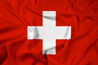 İsviçre bayrağı sallayarak