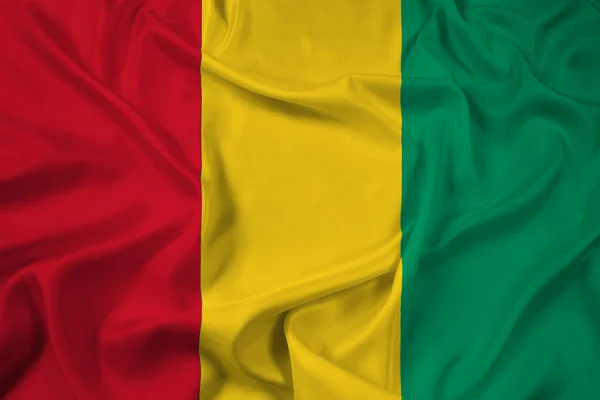 Ondeando bandera de Guinea — Foto de Stock