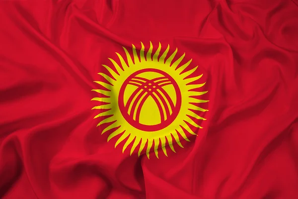 키르기스스탄 깃발을 흔들며 — 스톡 사진