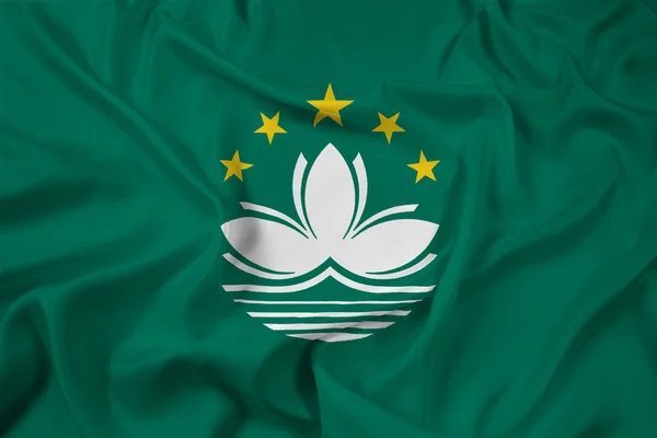 Schwenken der Macau-Flagge — Stockfoto