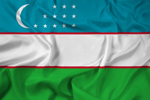 Machać flaga Uzbekistanu — Zdjęcie stockowe