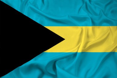 Bahamalar bayrağı sallayarak