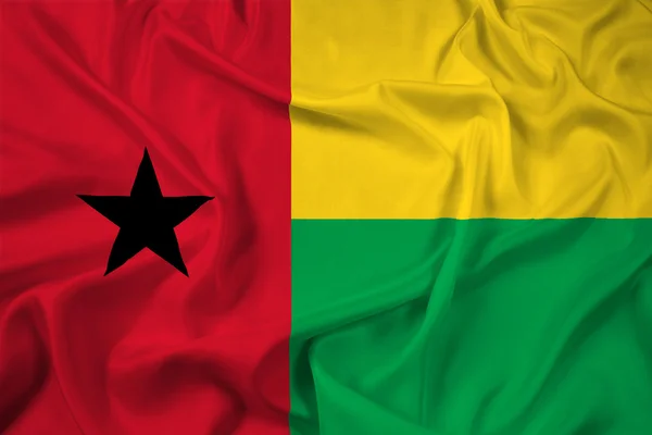 Ondeando la bandera de Guinea Bissau — Foto de Stock