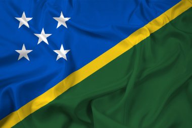 Solomon Adaları bayrağı sallayarak