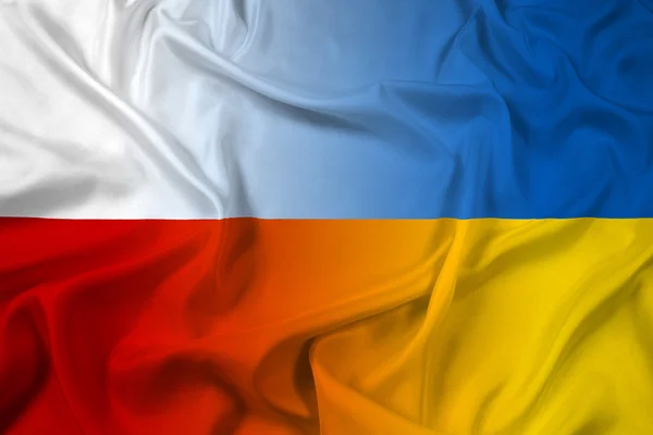 Waving Polen og Ukraine Flag - Stock-foto