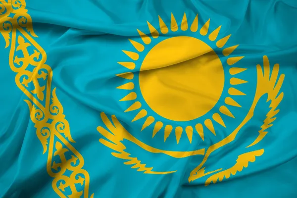 Viftar Kazakstan flagga — Stockfoto