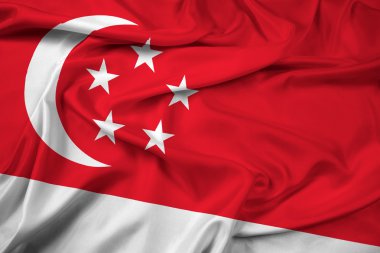 Singapur bayrağı sallayarak