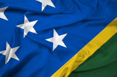 Solomon Adaları bayrağı sallayarak