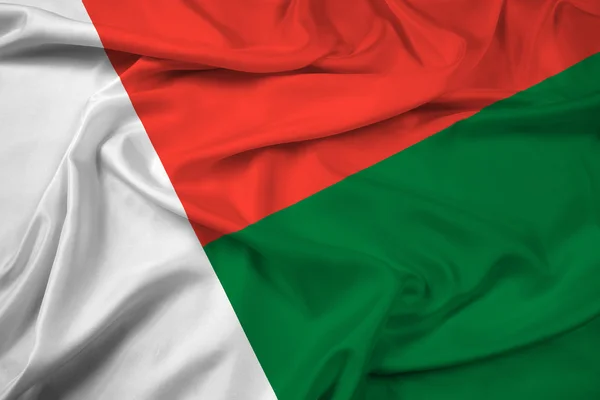 Ondeando la bandera de Madagascar —  Fotos de Stock