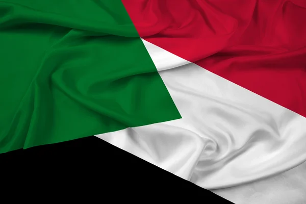 Sudan-Flagge schwenkend — Stockfoto