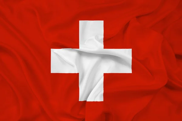 Lambaikan bendera Swiss — Stok Foto