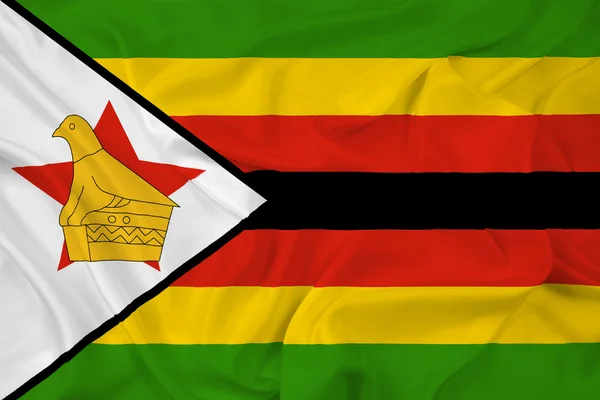 Macha flagą zimbabwe — Zdjęcie stockowe