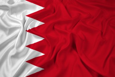 Bahreyn bayrağı sallayarak