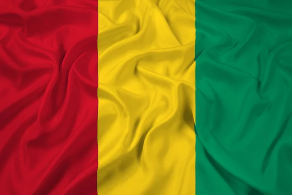 ギニアの国旗を振ってください。 — ストック写真