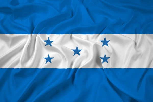 Размахивая флагом Гондураса — стоковое фото