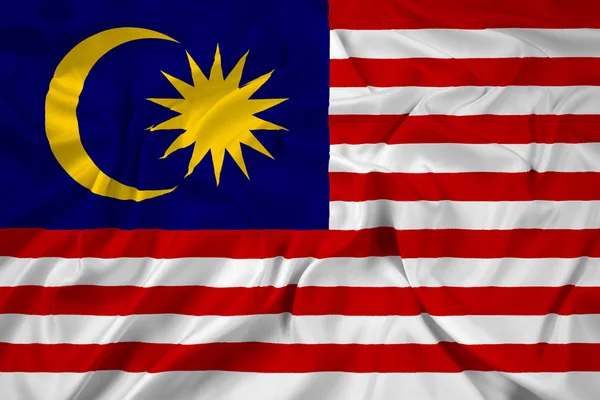 Malezya bayrağı sallayarak — Stok fotoğraf