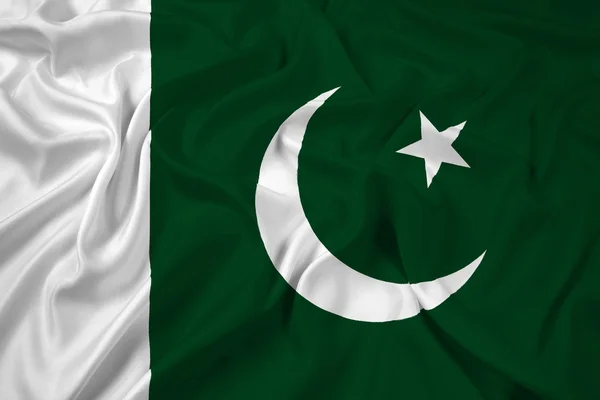 Machanie flagą Pakistanu — Zdjęcie stockowe