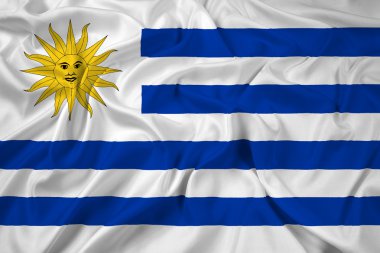 Uruguay bayrağı sallayarak