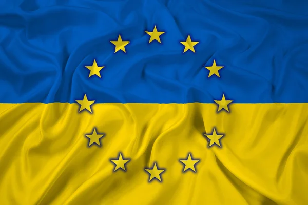 Acenando com a Ucrânia e a bandeira da UE — Fotografia de Stock