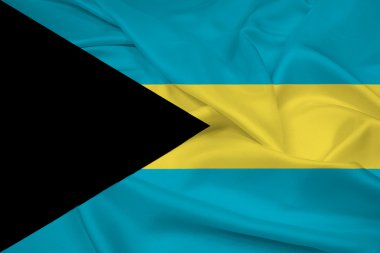 Bahamalar bayrağı sallayarak