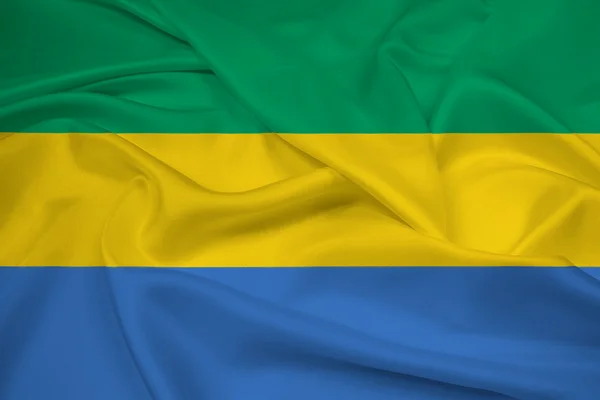 Размахивая флагом Габона — стоковое фото