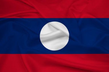 Laos bayrağı sallayarak