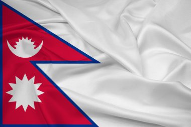 Nepal bayrağı sallayarak