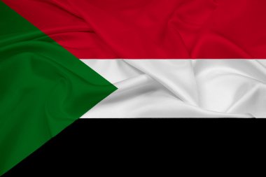 Sudan bayrağı sallayarak