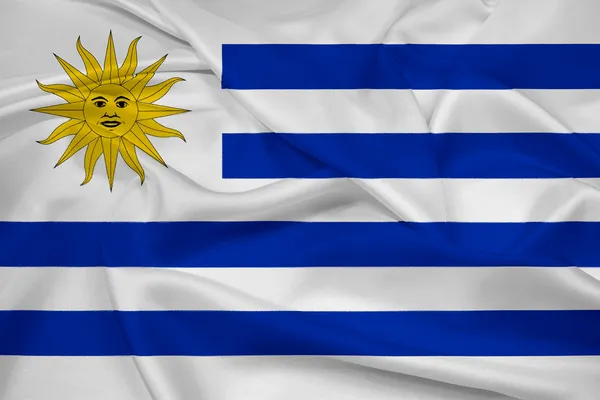 Uruguay-Flagge schwenkend — Stockfoto