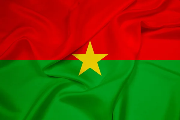 Ondeando la bandera de Burkina Faso — Foto de Stock