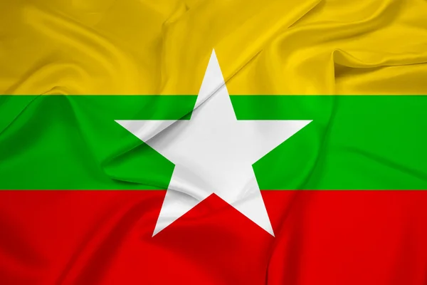 Macha flagą Birmy — Zdjęcie stockowe