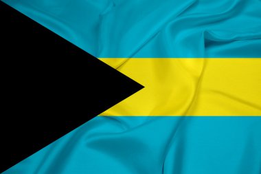 Bahamalar bayrağı sallayarak