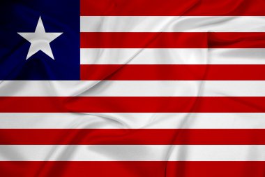 Liberya bayrağı sallayarak