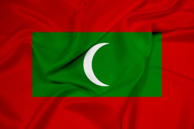 Maldivler bayrağı sallayarak