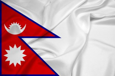 Nepal bayrağı sallayarak