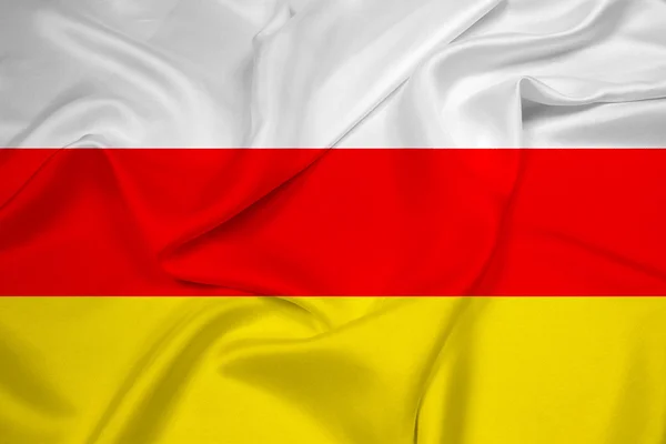 Viftar södra Ossetien flagga — Stockfoto