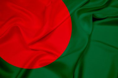 Bangladeş bayrağı sallayarak