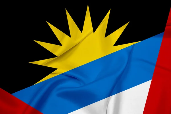 Ondeando la bandera de Antigua y Barbuda — Foto de Stock