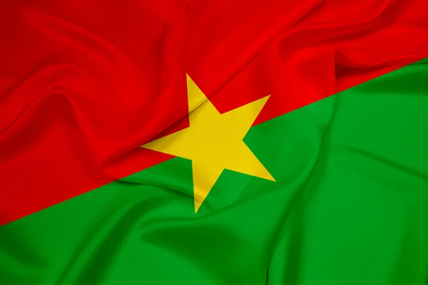 Ondeando la bandera de Burkina Faso — Foto de Stock