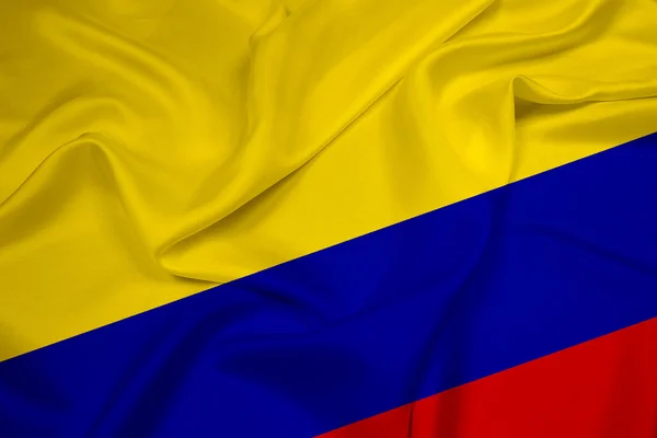 Machanie flagą Kolumbii — Zdjęcie stockowe