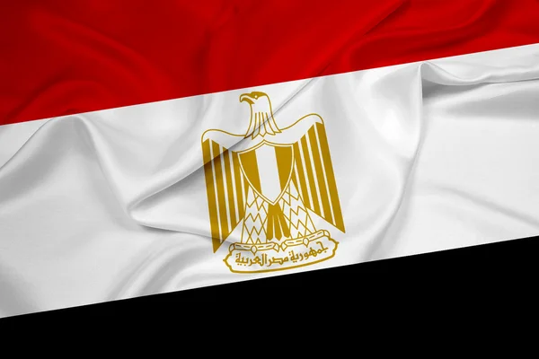 Mısır bayrağı sallayarak — Stok fotoğraf