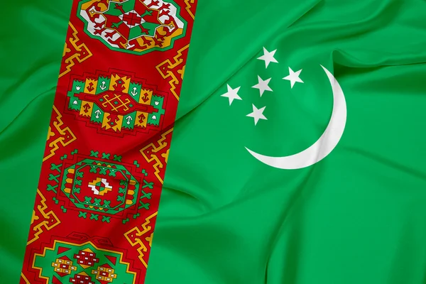 Vlající vlajka Turkmenistánu — Stock fotografie