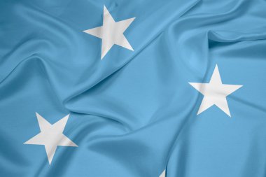 Mikronezya bayrak sallayarak