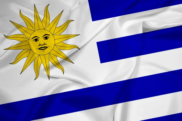 Viftar uruguay flagga — Stockfoto