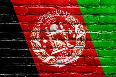 tuğla duvara boyalı Afganistan bayrağı