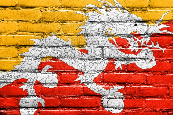 Bhoutan Drapeau peint sur un mur de briques — Photo
